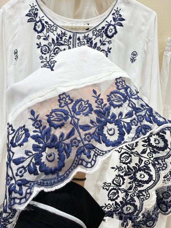Code-0092 Hania Aamir vibes in timeless white _ blue 🤍💙_For price _ details_ comment ❤️ and we_ll DM you___This viral Farshi Salwar suit is your _3.jpg White Georgette A59